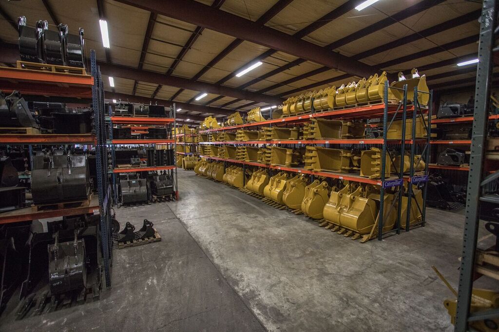 FLECO warehouse racks stocked with buckets